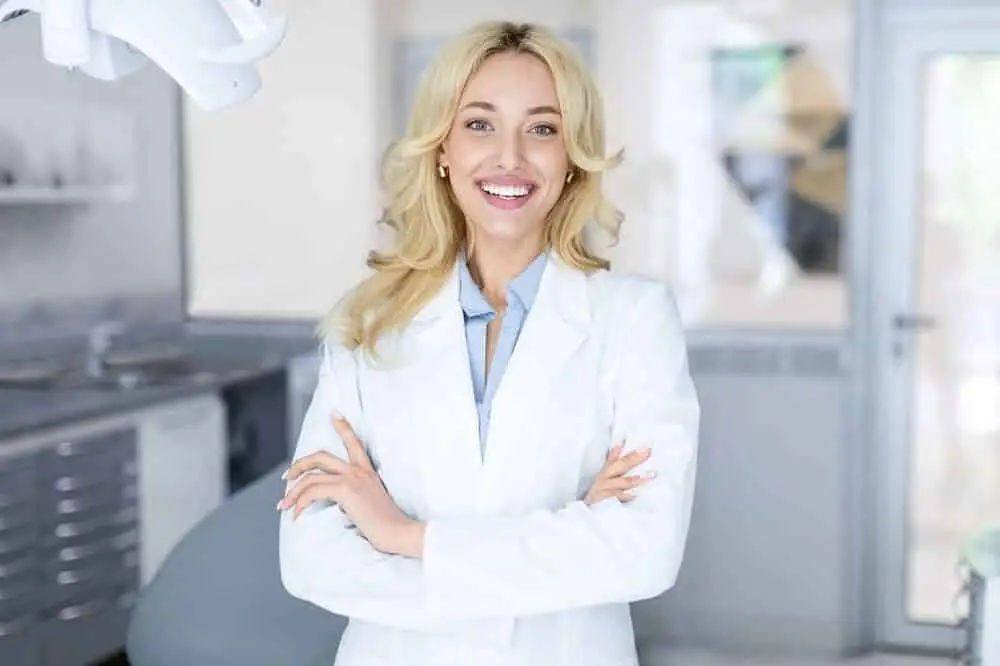 Cheerful doctor facing the camera